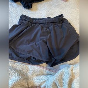 black lululemon tracker v shorts